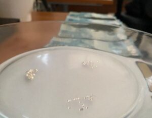 PRF em Rondônia apreende mais de 70 diamantes e milhares de reais na capital do estado